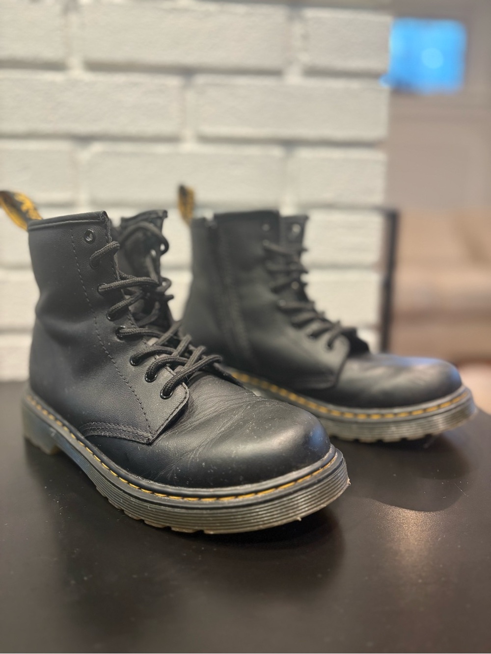 Dr. Martens Black Leather Kids Lace-Up Boots with Yellow Welt Stitching